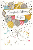 The congratulations card pictured here offers a visual celebration that feels perfectly suited to the easygoing charm of Raynes Park. Centred on the card is a buoyant cluster of balloons, drawn like a bouquet floating upward, their rounded shapes slightly overlapping to create depth and softness. The colour scheme is a sophisticated mix of warm golds, soft silvers, dusky champagne, pastel blues, delicate pinks, and understated greys, all finished with a subtle sheen that suggests metallic printing. Each balloon is decorated with thoughtfully placed details-tiny starlike dots, glitter-inspired shading, and fine linear patterns-that add a sense of sparkle, as if the balloons are catching late-day light over nearby Wimbledon Chase. From the base of the cluster, slender ribbons cascade in relaxed curves, rendered in gold and silver tones that twist and loop gracefully toward the bottom edge. Around the balloons, the pale background is dotted with small stars, scattered confetti, and gentle swirls, evoking the sense of motion and happiness that follows an unexpected congratulations. A curved banner stretches across the composition, holding the message Congratulations To You in elegant, flowing script that feels both celebratory and sincere. The overall effect is light, polished, and full of quiet joy, like a moment of shared pride between friends. It is easy to imagine this card travelling with a fresh bouquet from Flowers Raynes Park, delivered locally to mark a graduation, a promotion, or any special achievement, offering a beautifully illustrated way to say how proud you are of the recipient's success.